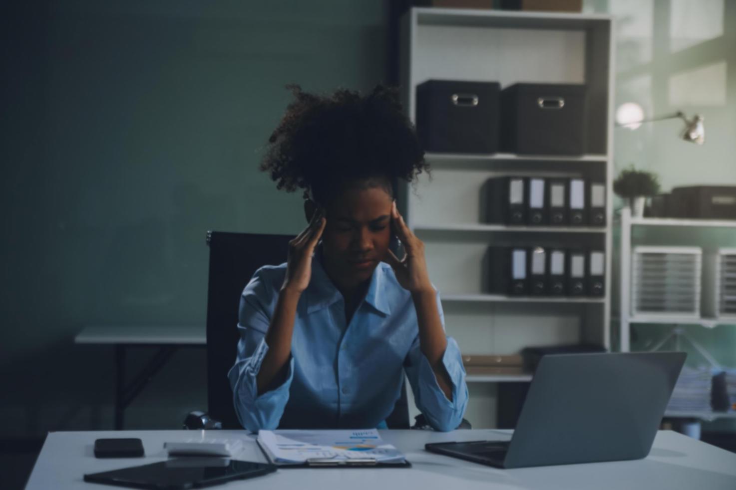 Financial growth charts and success metrics displayed on computer screens